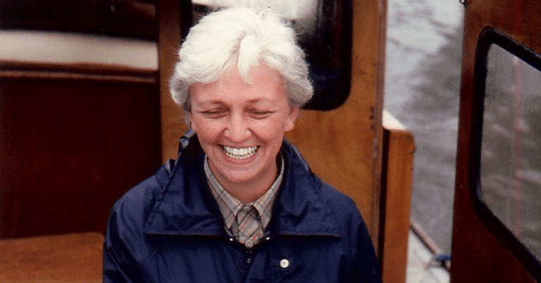 A photo of mum at the helm on a family boating holiday